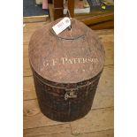 An old painted tin hat box with domed top, painted 'G F Paterson', height including handle 50cm.