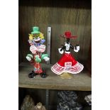 A Murano glass figure of lady, 20cm high; together with a Murano figure of a clown, 21cm high.