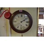 A 19th century oak circular wall clock, having 7½in enamel dial decorated Roman numerals, with