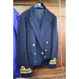 A Royal Naval Lt Commander's jacket and trousers.
