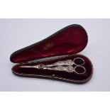 A cased pair of Victorian silver grape scissors by Charles Reily & George Storer, London 1841, 113g.