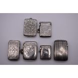 Five various Victorian and later silver vesta cases, 102.5g; together with a similar unmarked