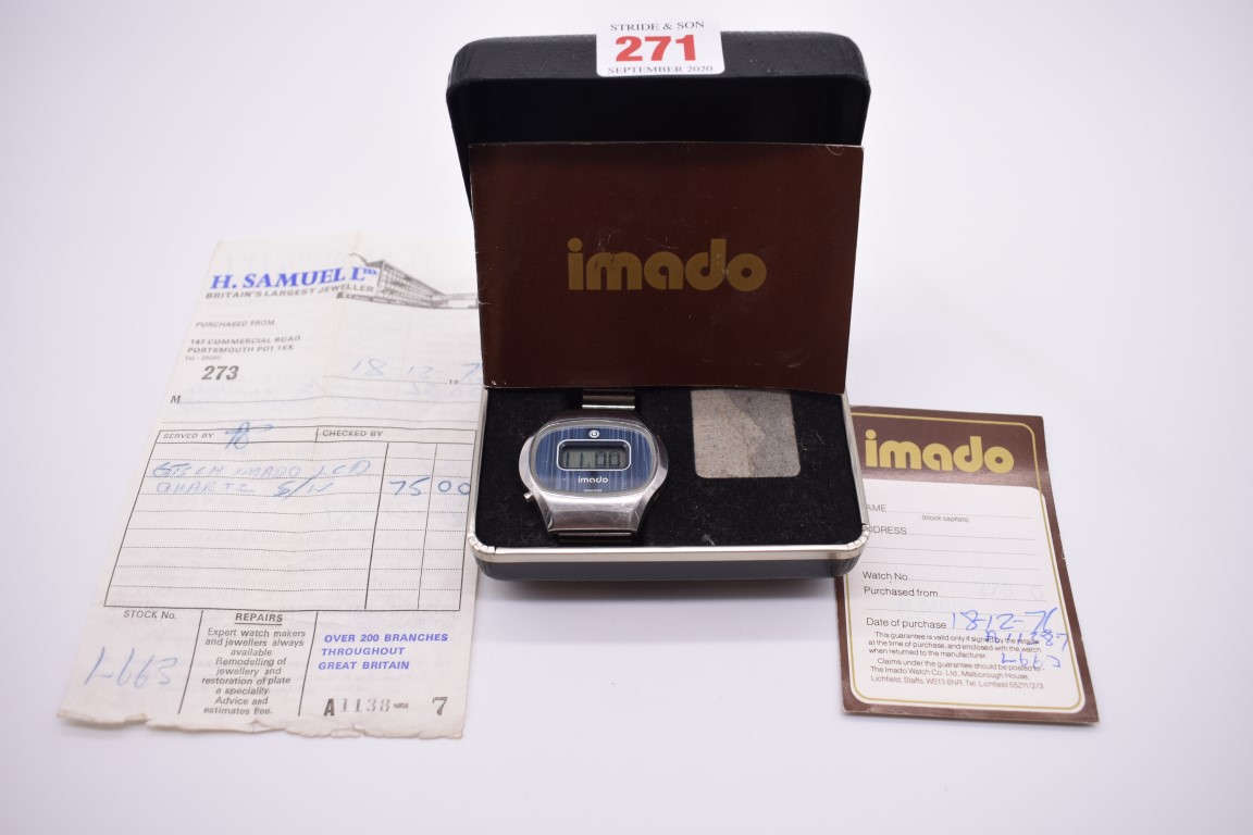 A 1970s Imado stainless steel quartz LED wristwatch, with box, original purchase receipt,