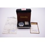 A 1970s Imado stainless steel quartz LED wristwatch, with box, original purchase receipt,