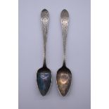 A pair of Irish bright cut silver teaspoons, makers mark indistinct, Dublin, 35.5g.