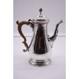 A George III silver coffee pot, by Daniel Smith & Robert Sharp, London 1764, 26cm high, 907g all in.