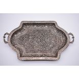 An ornate Arabic twin handled rectangular tray, stamped silver, 46.5cm wide.