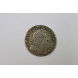 Coins: a George 1 1723 South Sea Company silver shilling.