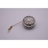 A sterling silver mounted yo-yo, by Gorham, 5.5cm diameter.