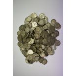Coins: a quantity of UK silver and part silver coinage, 1680g.