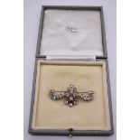An impressive Edwardian diamond brooch, the unmarked yellow metal and silver mount set brilliant cut