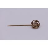 Of motoring interest: a gold 'Leyland Motors' tie pin, stamped 9ct, 5cm long, 1.6g.