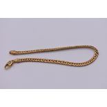 A gold flat link bracelet, stamped 375, 18cm, 4.2g.