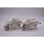 A good pair of novelty pierced silver wheelbarrows, by George Nathan & Ridley Hayes, Chester