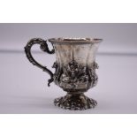 A William IV rococo silver baluster mug, makers mark indistinct, London 1833, 9cm high, 157g.