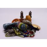 A quantity of costume jewellery, to include chunky bangles and beads.