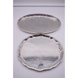 A German sterling silver oval tray, by E H, 31cm diameter; together with a sterling silver salver,