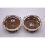 A scarce pair of George III silver bottle coasters, makers mark indistinct, possibly Rebecca