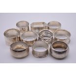 Ten various silver napkin rings, 270g.