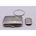 A small group of silver items, comprising: a cigarette case, by John Henry Wynn, Birmingham 1929;