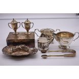 A quantity of silver items, to include: a twin handled sugar bowl, by Mappin & Webb, Birmingham
