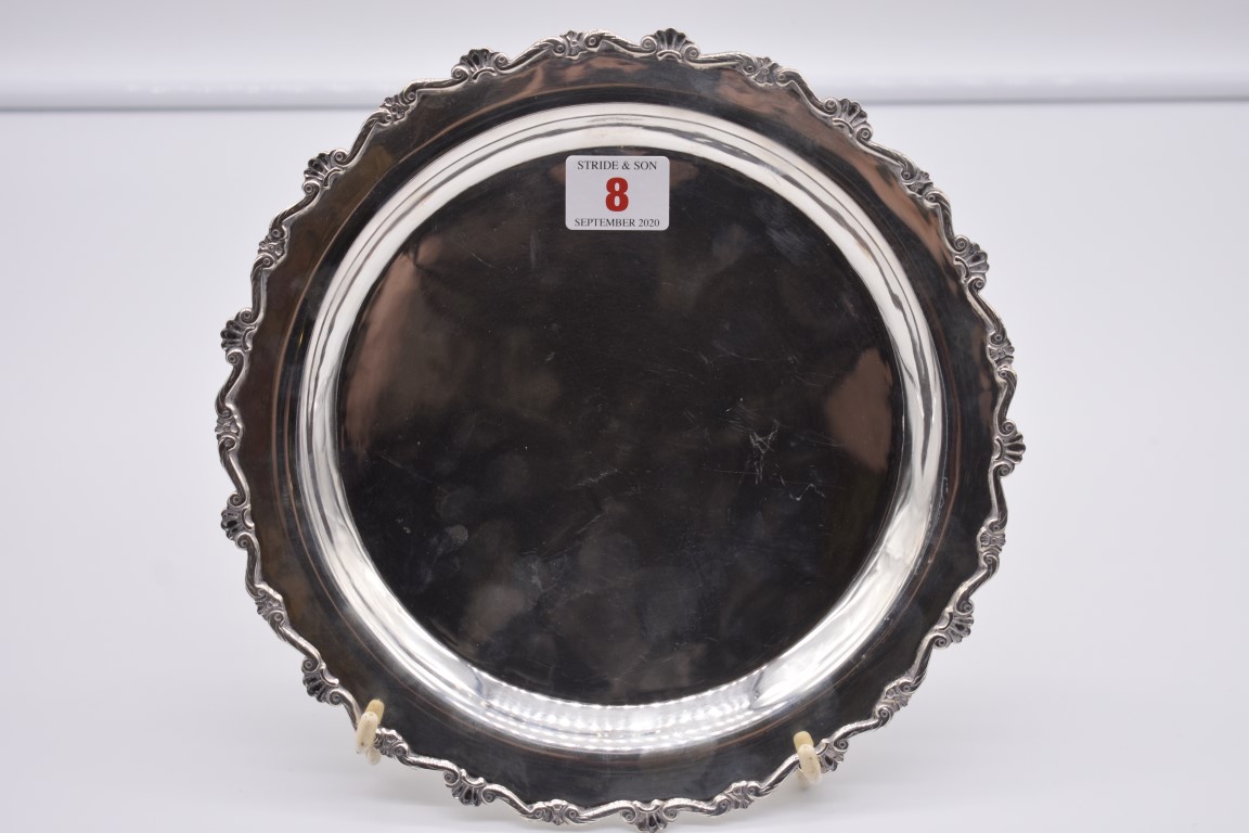 A Continental .900 silver salver, 24cm diameter.
