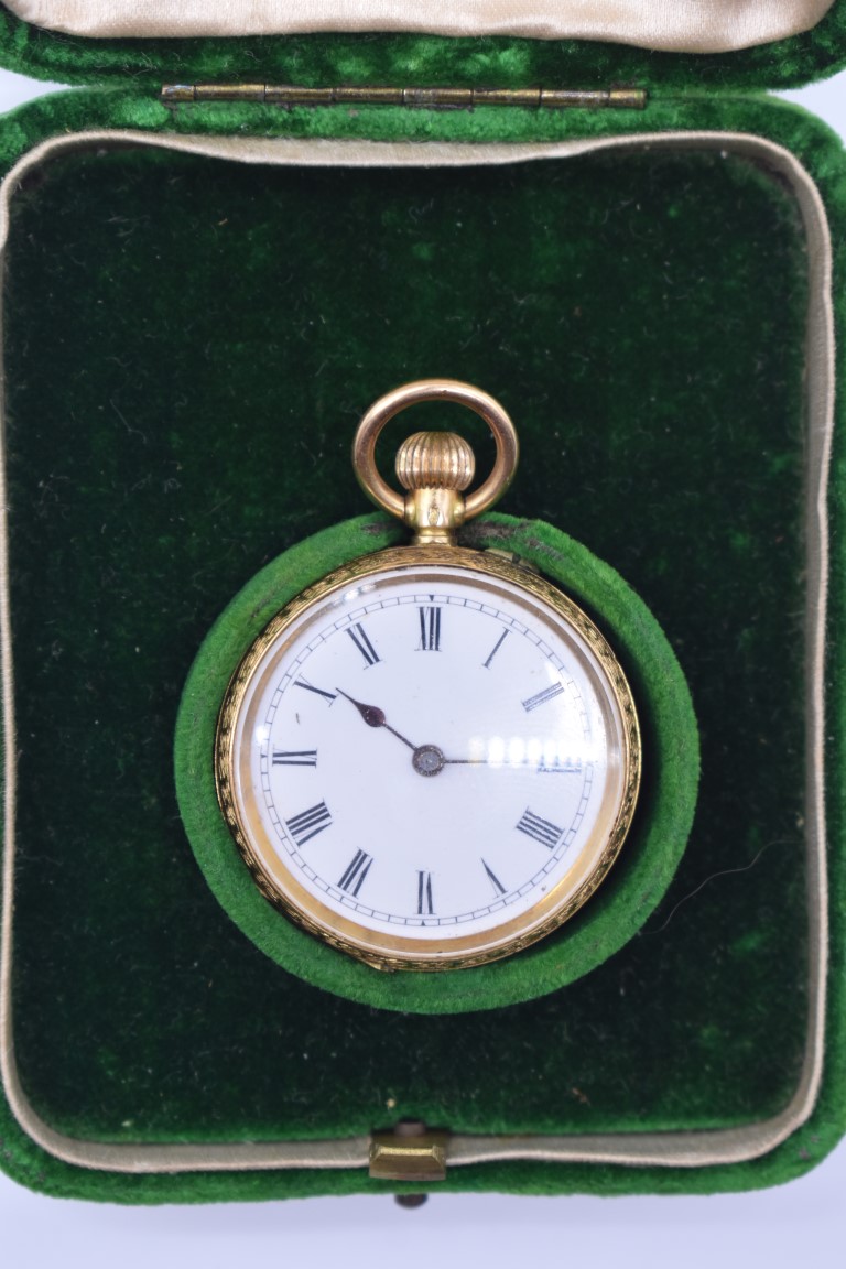 A chased gold stem wind fob watch, stamped 18k, having enamel dial and Roman numerals, 3cm diameter, - Image 2 of 4