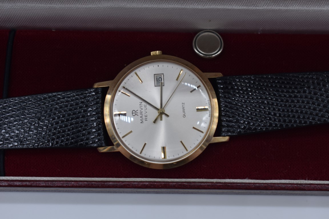 A Marvin 'Revue' 9ct gold quartz wristwatch, 32mm, cal.ETA  555 415, on original leather strap, with - Image 2 of 3