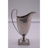 A silver helmet jug, by Richard Parker, Chester 1932, 14cm high, 115.5g.