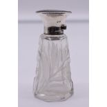 A tortoiseshell and silver mounted cut glass perfume bottle, makers mark indistinct, London 1916,