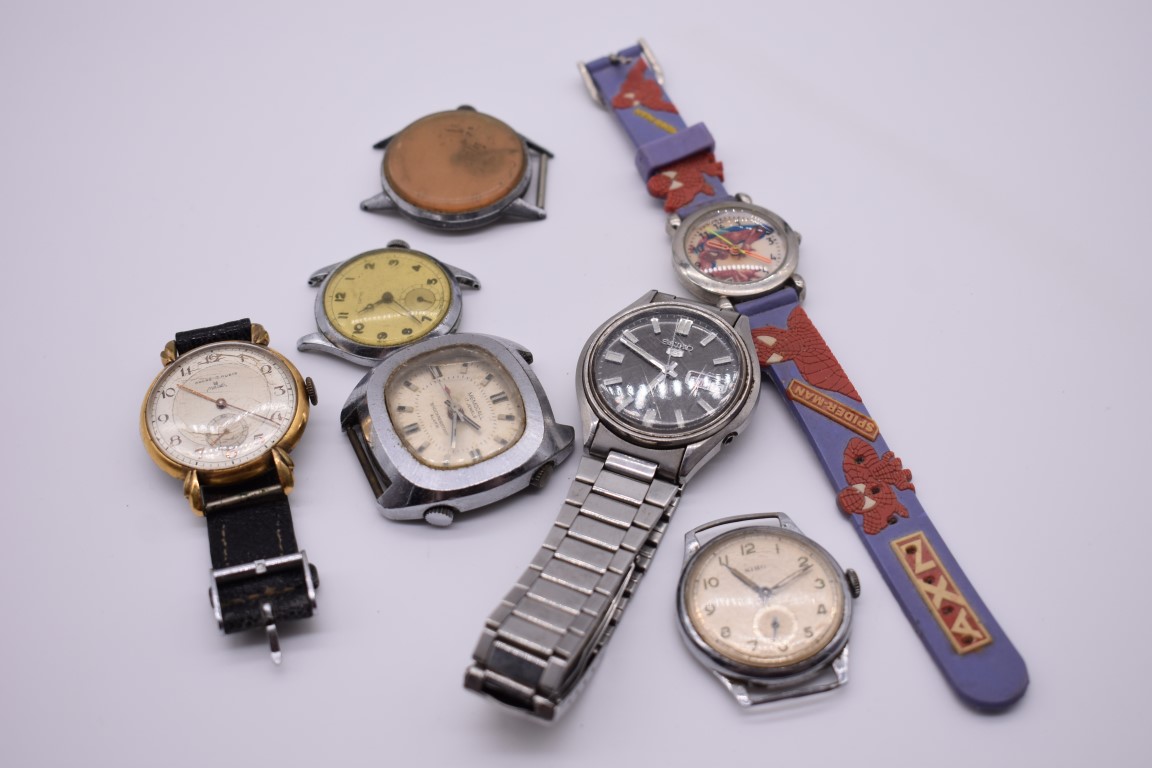 A Seiko 5 stainless steel automatic wristwatch; together with a vintage Memocall wristwatch and five