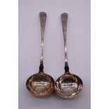 A pair of George III bright cut silver sauce ladles, by George Smith I, London 1774, 91.5g.