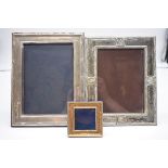 A silver photograph frame, by John Bull Ltd, London 1985, 25.5 x 19.5cm; together with square