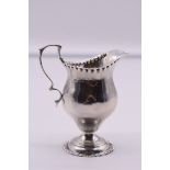 A Victorian silver milk jug, by John Henry Rawlings, London 1894, 10.5cm high, 87g.