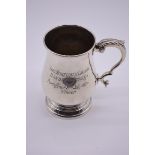 A silver baluster mug, by J W Flynn, London 1973, engraved presentation, 13.5cm high, 340g.