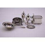 A silver mustard, by S W Smith & Co, Birmingham 1917, 6cm high; together with other silver items