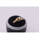 A gold and diamond solitaire ring, stamped 18ct, the brilliant cut stone approximately 0.33ct, 4.