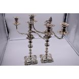 A pair of George IV silver candlesticks by Creswick & Co, Sheffield 1829, having weighted bases