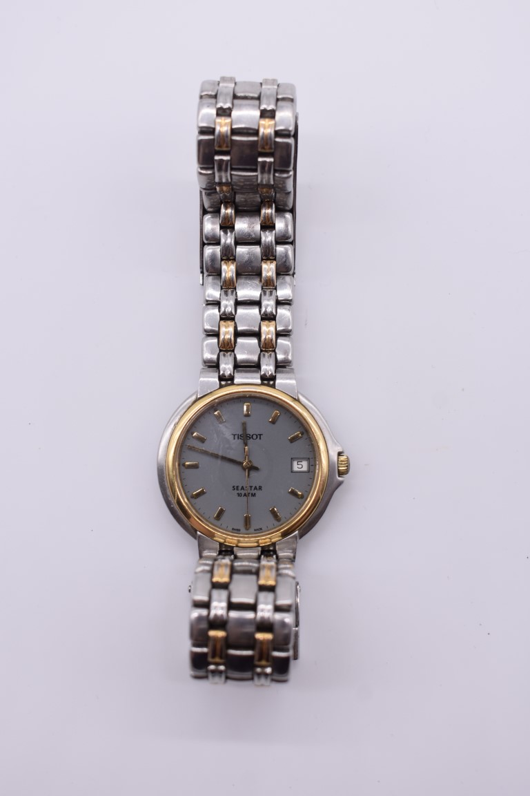 A Tissot 'Seastar' stainless steel and gold plated quartz wristwatch, 35mm, ref 260-S668.