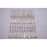 A set of twelve pairs of silver and mother of pearl dessert knives and forks, by Mappin & Webb