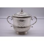 An impressive silver twin handled porringer and cover, by Walter H Willson Ltd, London 1928, with