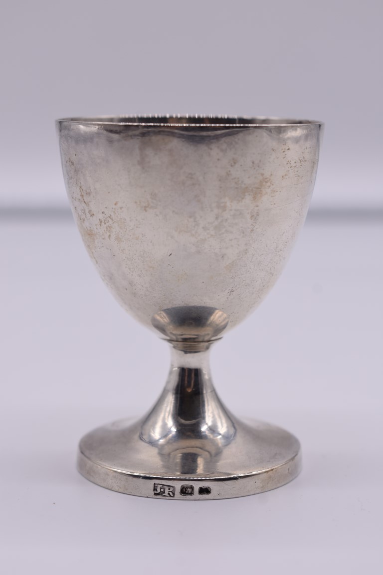 A white metal duck egg cup, by J R, marks indistinct, 8cm.