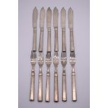 A set of six Chinese silver fish knives and forks, by Wang Hing, stamped 900.