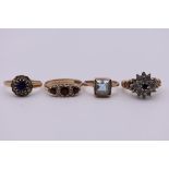Three various gem set gold rings, hallmarked/stamped 375, 9.3g; together with a similar unmarked