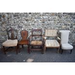 A Victorian mahogany hall chair; together with four other chairs. This lot can only be collected