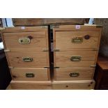Two pine and brass bound bedside chests, 60.5cm high x 42cm wide.