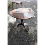 An antique oak tripod table. This lot can only be collected on Saturday 5th September (10-2pm)