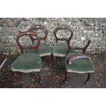 A set of four Victorian mahogany and green upholstered dining chairs. This lot can only be collected