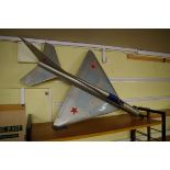 A vintage painted model of a US jet plane, 103cm long.