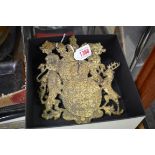 Two antique gilt metal Royal Coats of Arms, 17cm wide.